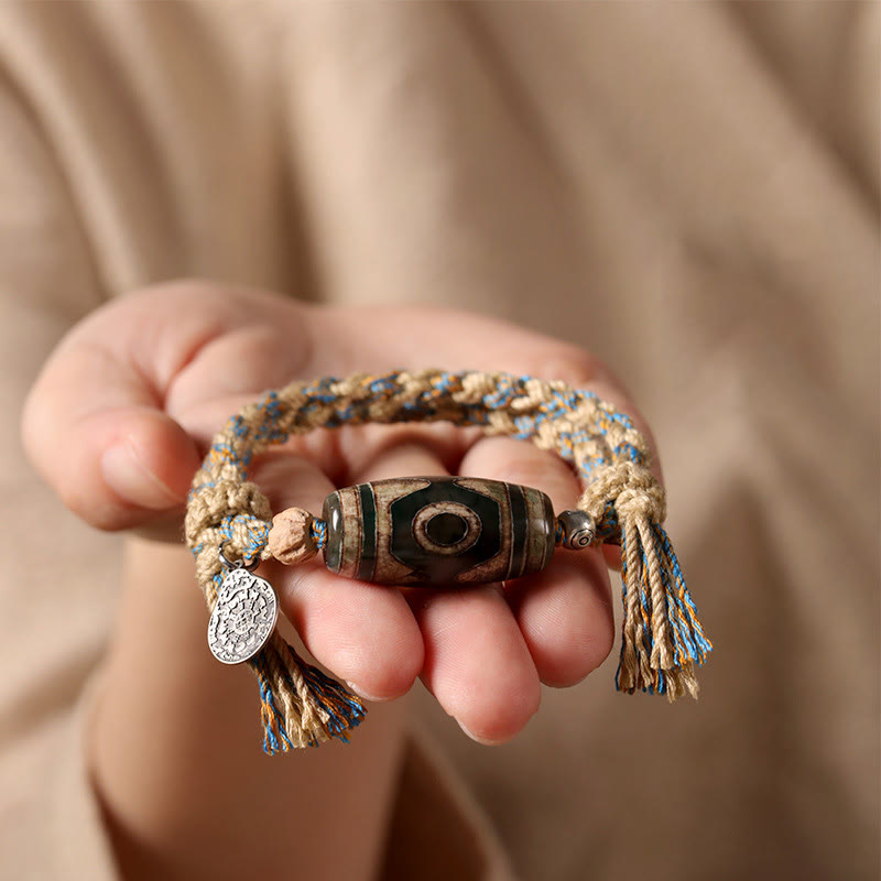 FREE Today: Wealth and Protection Handmade Tibetan Dzi Bead Braided String Bracelet