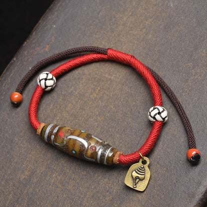 Buddha Stones Handcrafted Tibetan Nine-eye Dzi Bead Protection Rope Bracelet