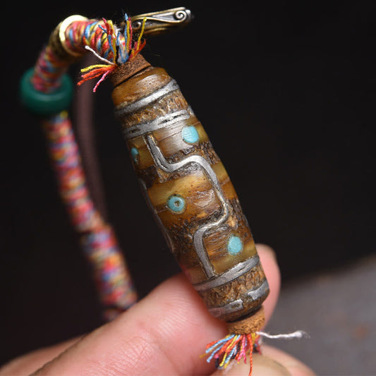 Buddha Stones Handcrafted Tibetan Nine-eye Dzi Bead Protection Rope Bracelet