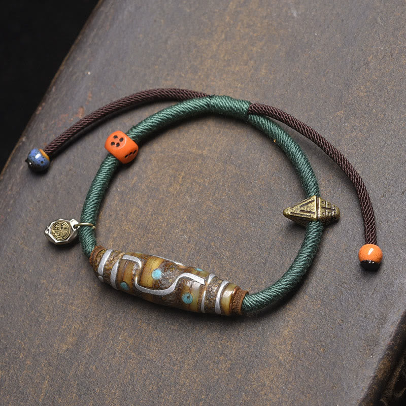 Buddha Stones Handcrafted Tibetan Nine-eye Dzi Bead Protection Rope Bracelet