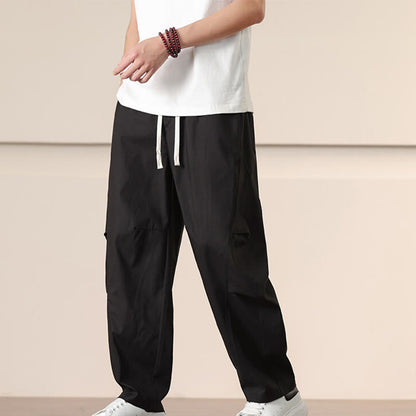 Buddha Stones Commute Spring Solid Color Drawstring Men's Harem Pants With Pockets