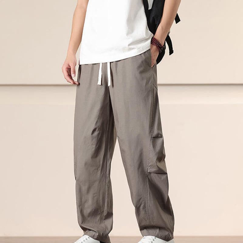 Buddha Stones Commute Spring Solid Color Drawstring Men's Harem Pants With Pockets