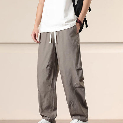 Buddha Stones Commute Spring Solid Color Drawstring Men's Harem Pants With Pockets