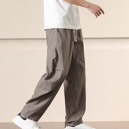 Buddha Stones Commute Spring Solid Color Drawstring Men's Harem Pants With Pockets