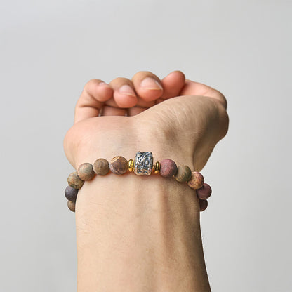 Buddha Stones Natural Picasso Jasper Buddha Face Energy Bracelet